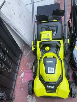 Lawnmower ryobi self propelled new come w 1-fast charger &1-6Ah battery $270 firm