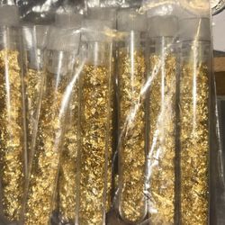 Nine individual tubes of white/flower gold
