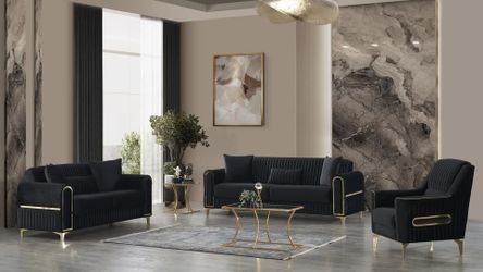 Sleek, vertical detailing sofa with polished gold accents