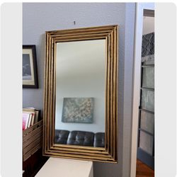 Vintage, Elegant, Baroque, Hollywood Regency style, Turner MTG large rectangular mirror multilayer gilt ornate frame with black accents. 43.5 x 25.5