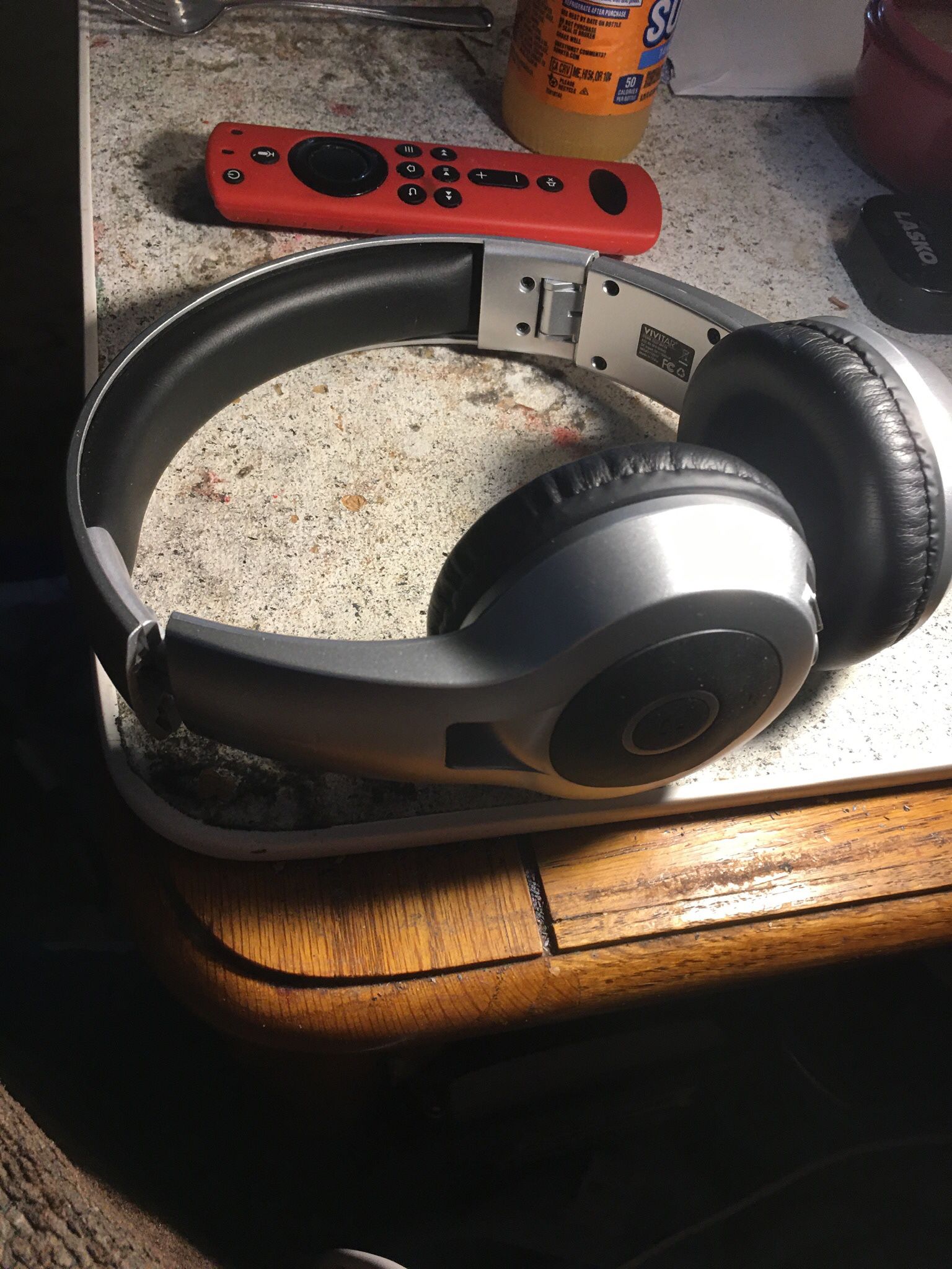 silver bluetooth headphones