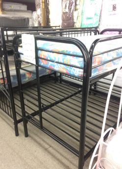 Twin over twin bunk beds with mattresses