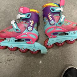 Girly roller blades size 7