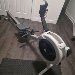 Concept2 RowErg Model D Indoor Rowing Machine with PM5 Monitor, Device Holder, Adjustable Air Resistance, Easy Storage (Gray)