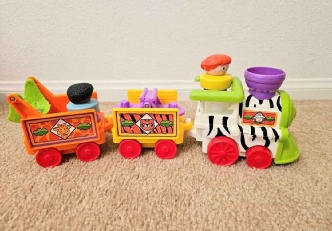 Safari Toy Train ... Plays a Tune, Colorful and Fun!