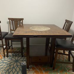 Height Table And Four Chairs 