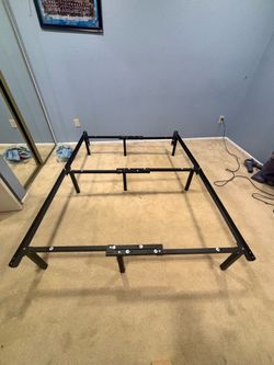 Adjustable metal mattress frame