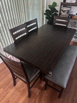 Dining Room Table, 4 chairs & 1 bench - walnut brown finish with gray faux leather upholstery feel