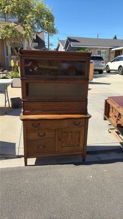 Base is small dresser quarter sawn oak with top piece same oak book case