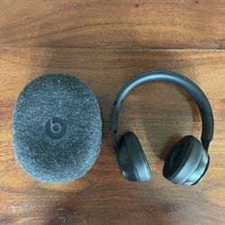 Black Beats Solo Pro headphones
