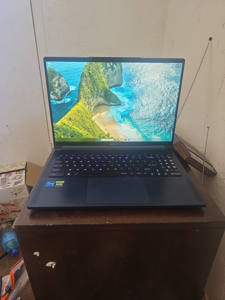 MSI Stealth 16 Studio (i7-13620H, RTX 4070, 32GB RAM, 1.5TB Storage)