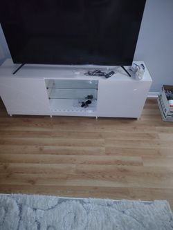 Modern white glossy TV stand