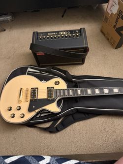 Les Paul Style Electric Guitar with Gig Bag and amp