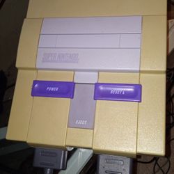 Super Nintendo Entertainment System With Games