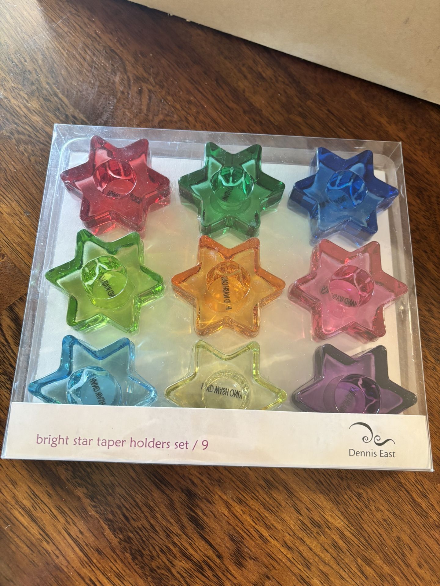 Two boxes of bright star taper holders (9 per box)