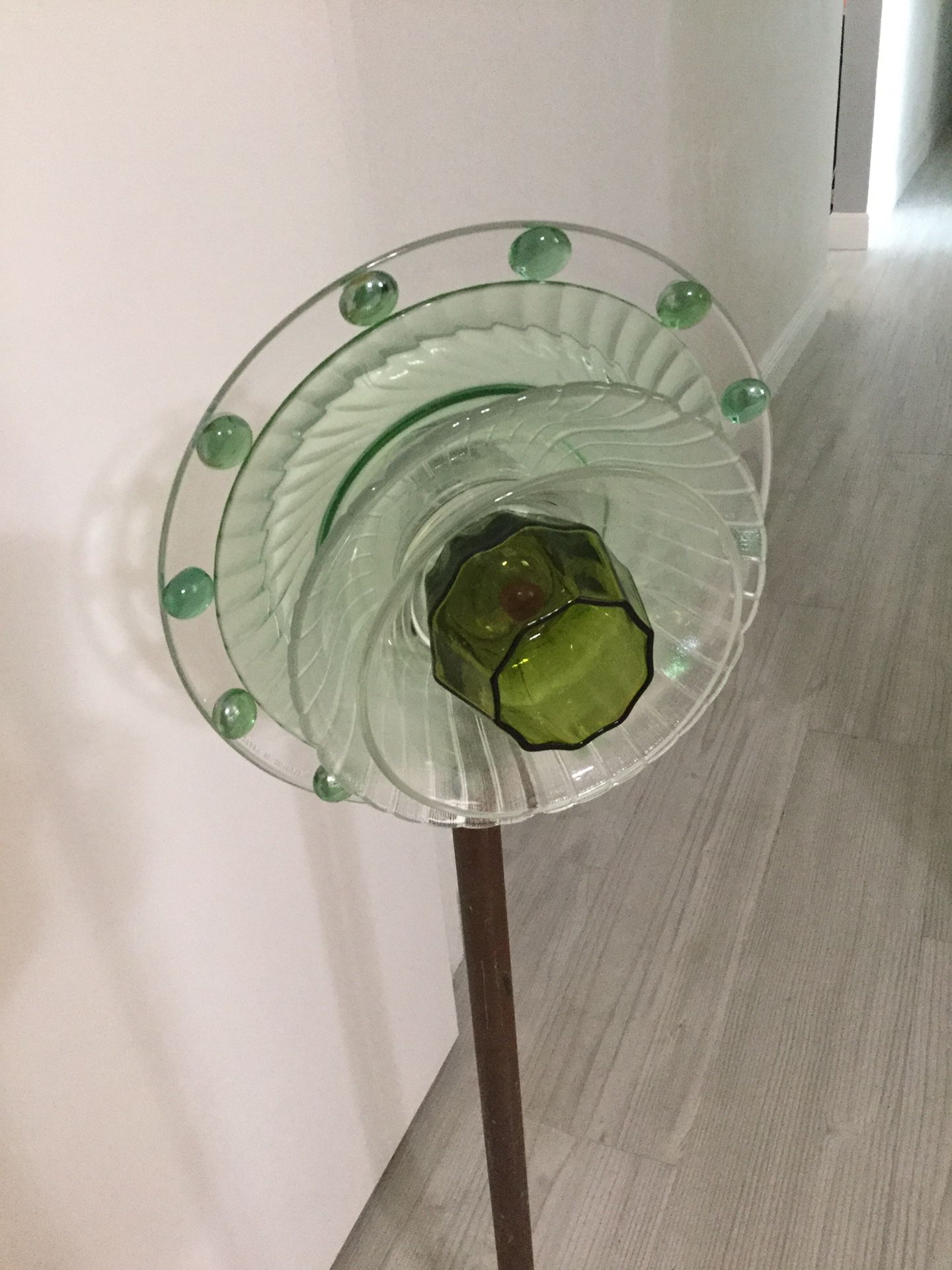 9” diameter garden glass flower. Upcycled plates and bowls. Mosaic marbles and beads. Garden decoration. Salt shaker used for hanging the flower unto