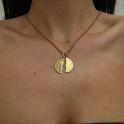 Brand new 18CT Solid Gold Italian designed pendant is a beautiful rare find. It has never been worn and both halves are complete. The twin pendant cha