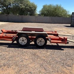 29ft U Haul Flatbed Car Hauler. With Hydraulic Brakes On Two Axles. Pull Out Ramps. 12 V Electric Winch.