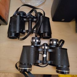 2 pairs of tasco binoculars ( vintage)