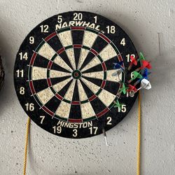 Dart board with darts