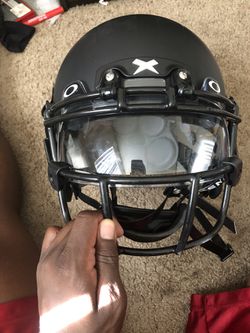 Xenith Youth large/adult medium helmet. Adult medium shoulder pads. Oakley  Football visor included. for Sale in Palmdale, CA - OfferUp