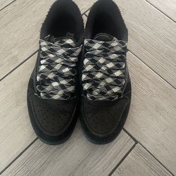 Travis Scott men’s black trainers