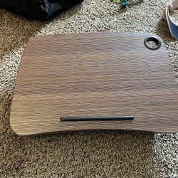 Laptop lap holder. Can hold a Mac book pro easily 