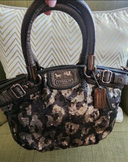 Coach  $70