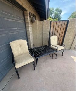 Patio set. New cushions. All metal. Table and chairs. Very nice condition.