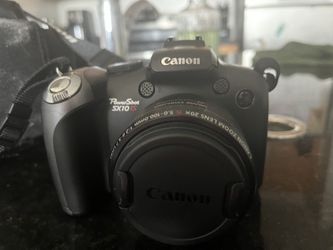 Canon PowerShot SX10 IS with 20x zoom lens.