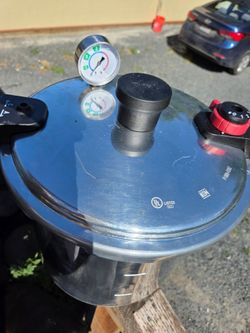 T Fal 22 quart pressure canner used twice  I can't  regulate my burner to maintain the proper heat  so I bought an electric one I paid $150 for it las