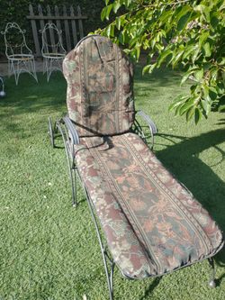 Vintage wrought iron chaise lounge with pad