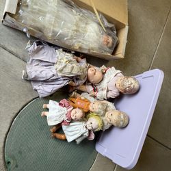 7 Vintage Dolls , One Is In The Box 