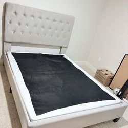 Moving!! Gently used queen bed frame - Price Negotiable!