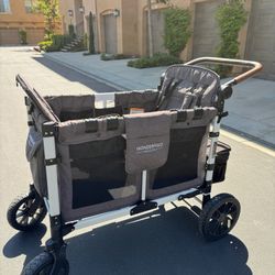 WONDERFOLD W4 Luxe Stroller Wagon (4 Seater) - Collapsible Wagon Stroller with Seats with Magnetic Buckle 5-Point Harnesses, Charcoal Gray-Black Frame