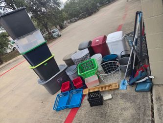 Assorted containers storage boxes cleaning supplies