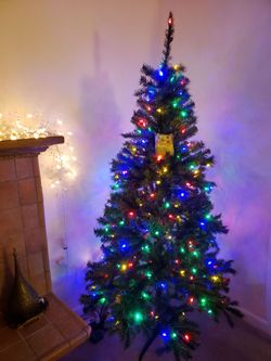 cl posting: 6.5 ft. Festive Pine Pre-Lit 3 color Artificial Christmas tree
