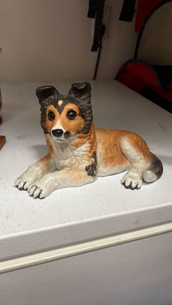 Dog figurine/enesco