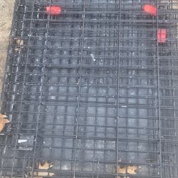 black metal wire dog crate Kong large 
The bottom is cracked 