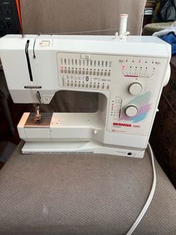 Bernina 1090 sewing machine w/case and extras- powers on and runs smooth