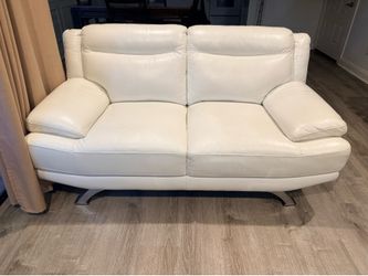 Authentic Sofia Vegara white leather loveseats (2)