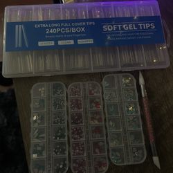 Nail tips and rhinestone gems 