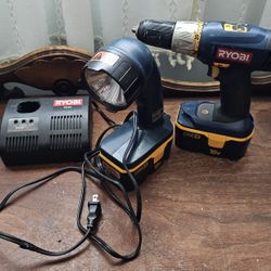 Ryobi Drill And Light And Charger