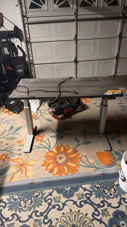 Raising electric desk