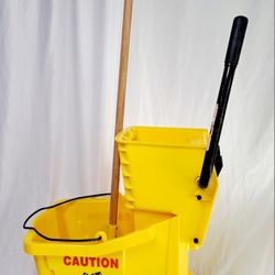 USED ONE TIME. RUBBERMAID COMMERCIAL CLEANING BUCKET WITH MOP
