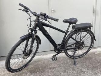 Juiced Cross Current E-bike Electric Bike  Needs battery. Screen has been damaged. See pics. 