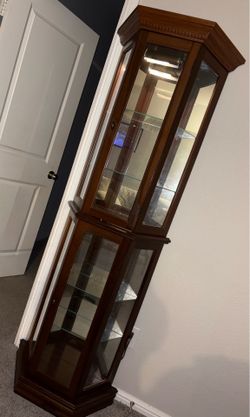 vintage Pulaski lighted half-hex curio cabinet