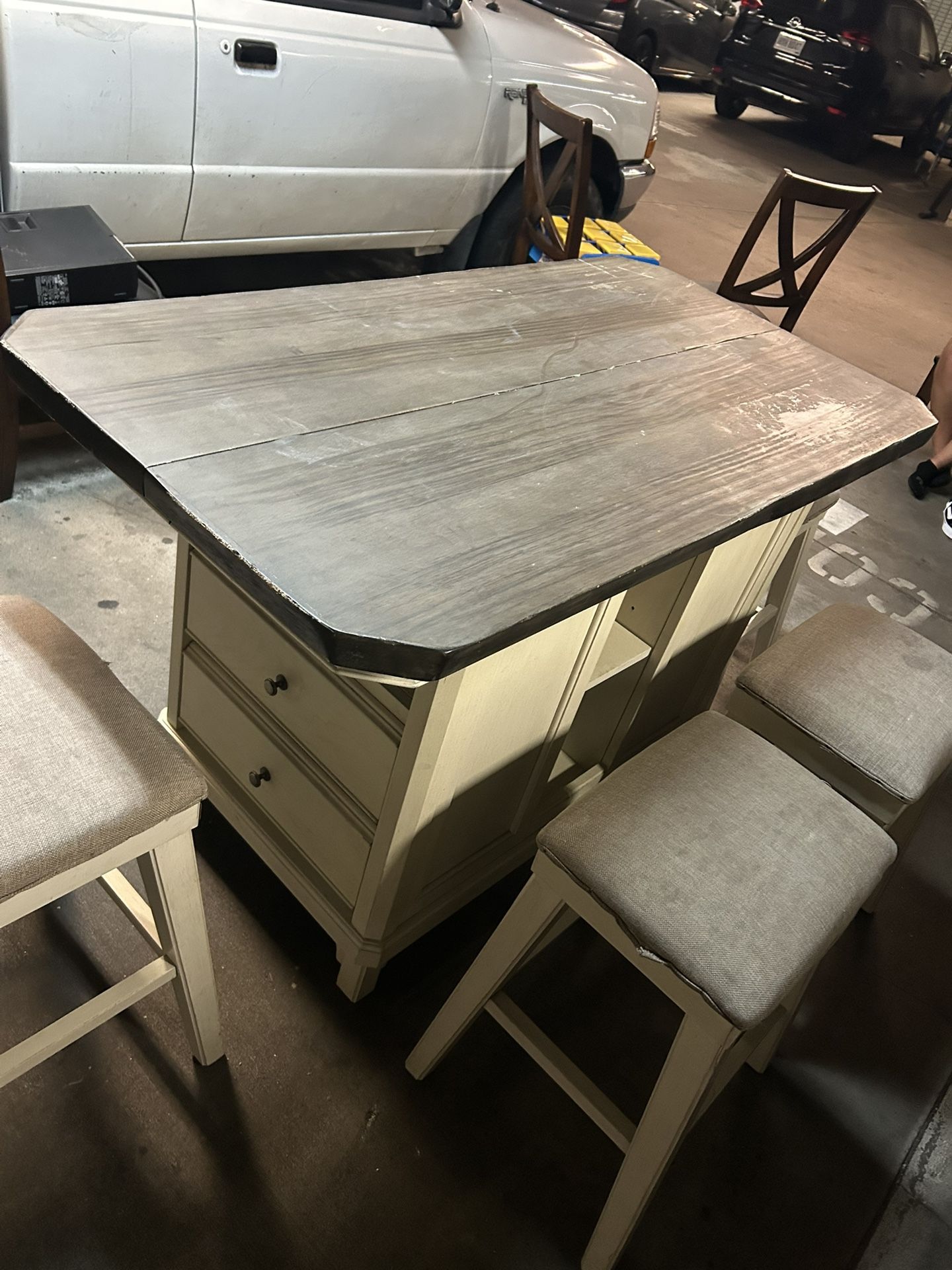 Heavy dining table with five stools and extension