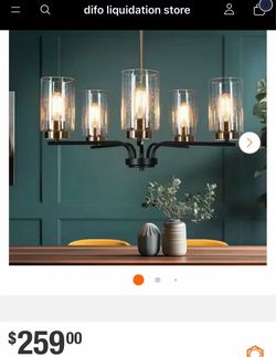 Transitional 24 in. 5-Light Brass and Black Candlestick Chandelier, Adjustable Dining Room Chandelier with Seeded Glass Receive the price $446 our p