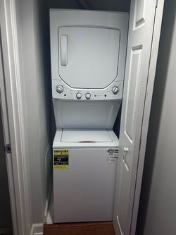 Brand new!  GE Stacked Washer Dryer Unit